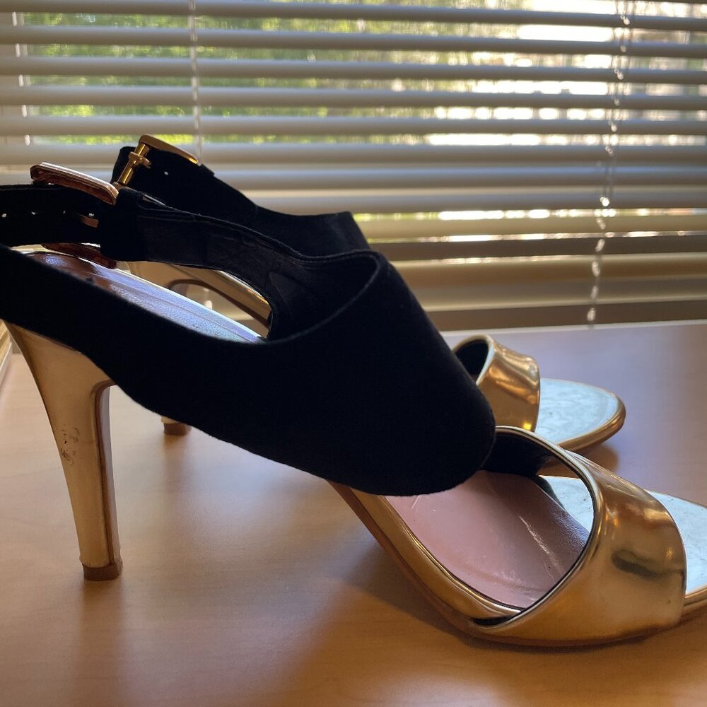 Black and gold heels